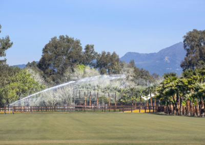 a polo field being irrigated