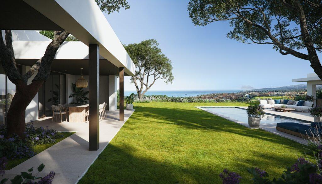 Modern luxury villa in Sotogrande with ocean views, private pool, shaded terrace, and lush landscaped garden.
